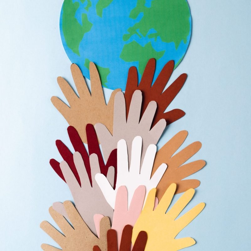 hands-together-under-the-earth-global-community-2026-03-25-00-45-21-utc (1)